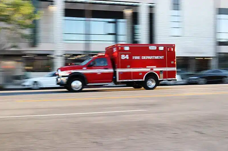 Emergency responders assist a pedestrian struck at S Figueroa Street and W 12th Street in Los Angeles.