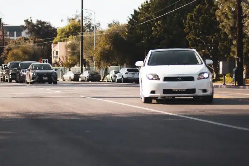 First responders assisting victims after a vehicle collision at a Los Angeles intersection
