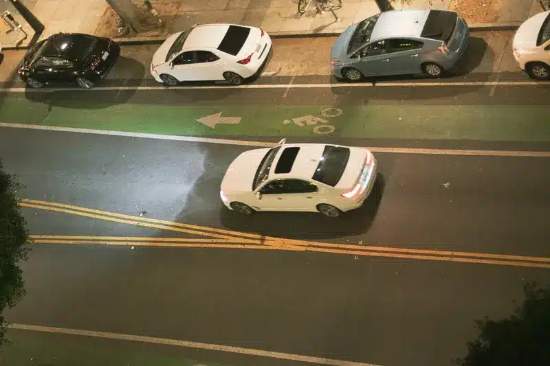 Emergency responders attend a collision with reported injuries on S Van Ness Avenue in Los Angeles.
