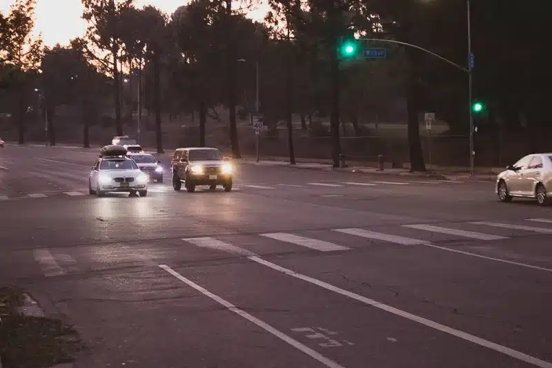 Injury crash scene on South Central Avenue with emergency vehicles and first responders