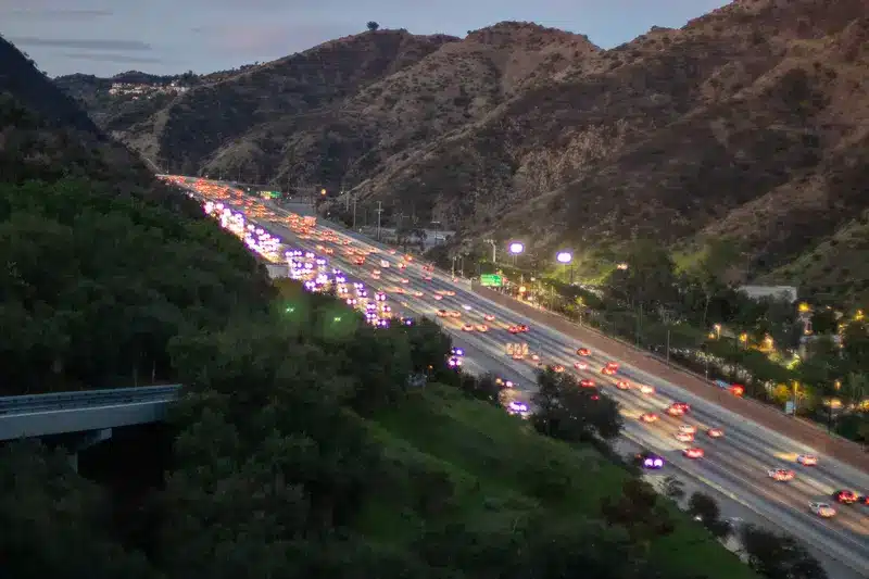 Emergency responders attend a two-vehicle crash with injuries on Olympic Boulevard in Los Angeles, California.
