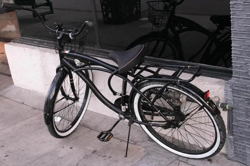Cyclist injured in a crash at W Olympic Boulevard and S Alvarado Street in Los Angeles.