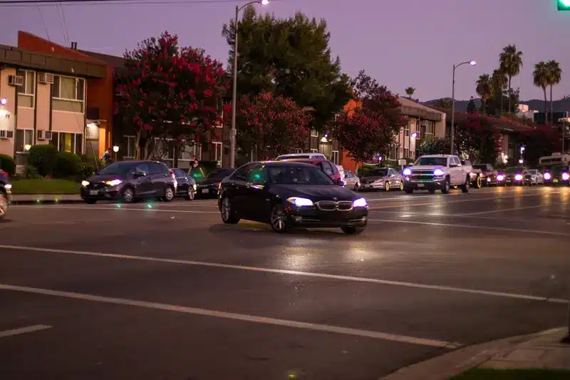 Emergency responders at the scene of a traffic crash with reported injuries near East 58th Place and Hooper Avenue in Los Angeles, California.